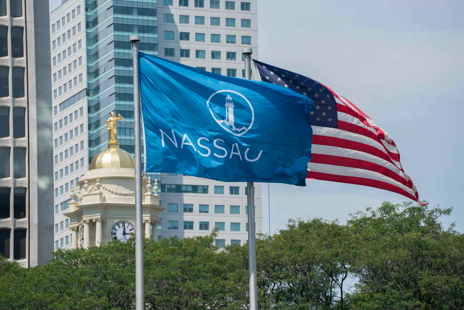 Nassau flag flies in the middle of the insurance capital where many actuaries find jobs